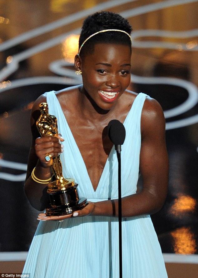 3106EDC600000578-3437766-One_of_the_most_powerful_Oscars_speeches_ever_came_from_Lupita_N-a-71_1455293396432