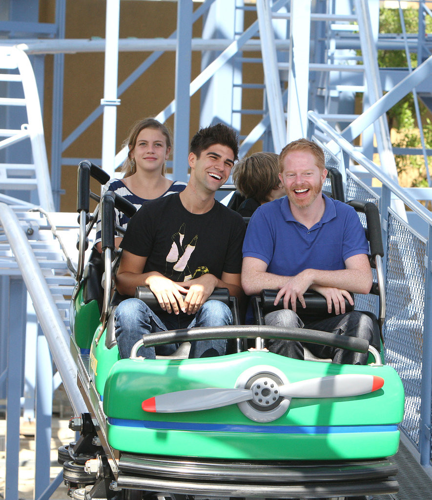 Jesse-Tyler-Ferguson-Justin-Mikita-hopped-ride-July-2011