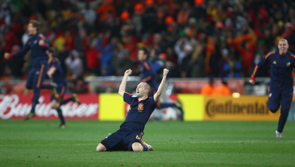 JOHANNESBURG, SOUTH AFRICA - JULY 11:  Andres Iniesta of Spain celebrates after his goal wins the World Cup for Spain during the 2010 FIFA World Cup South Africa Final match between Netherlands and Spain at Soccer City Stadium on July 11, 2010 in Johannesburg, South Africa.  (Photo by Lars Baron/Getty Images) *** Local Caption *** Andres Iniesta