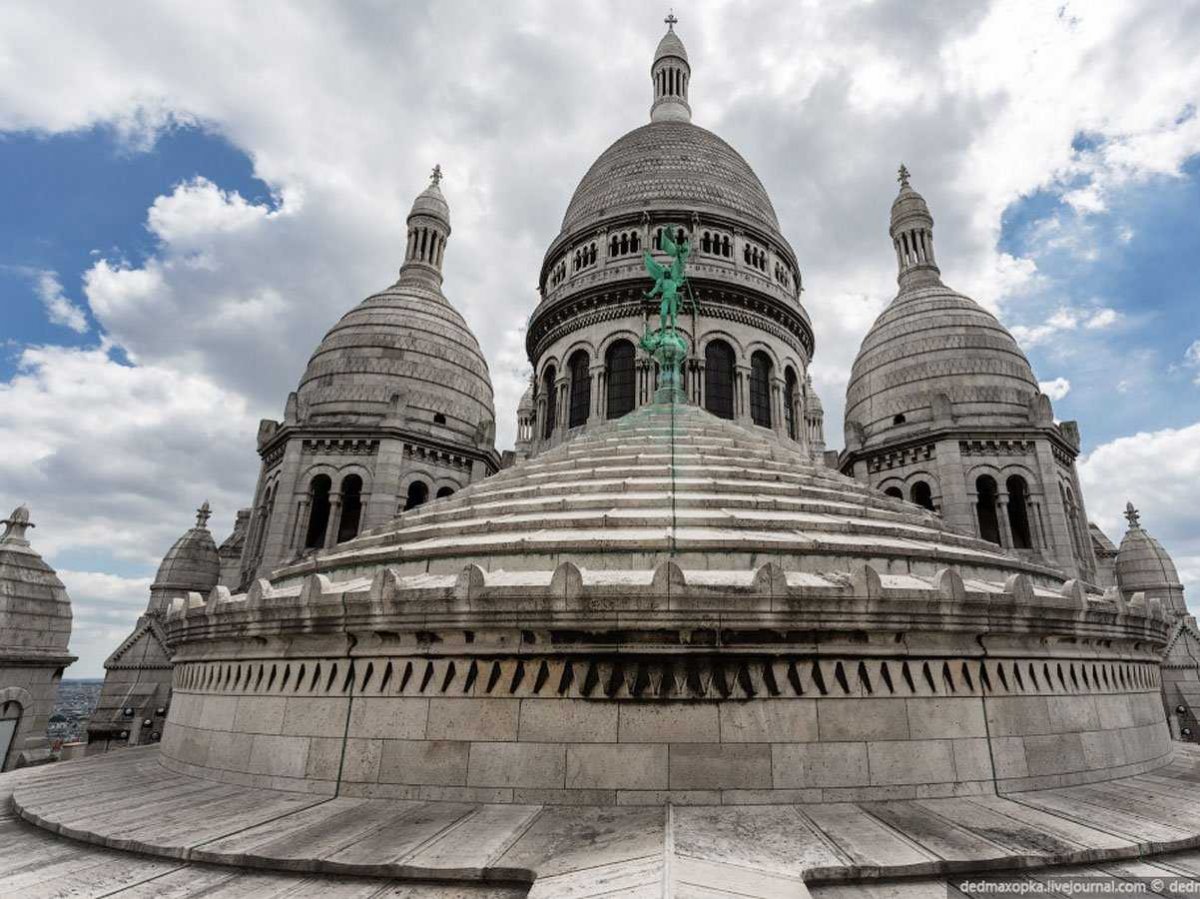 la-basilique-du-sacr-cur-de-montmartre-is-considered-one-of-the-most-iconic-monuments-in-paris-with-an-observation-deck-more-than-400-meters-1312-ft-high-that-offers-panoramic-views-of-the-capit