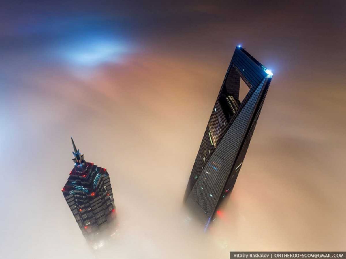 the-stunt-took-them-a-total-of-20-hours-since-they-entered-the-tower-at-night-scaled-the-crane-during-daybreak-and-waited-for-the-light-to-rise-to-capture-dream-like-views-of-the-neighboring-jin