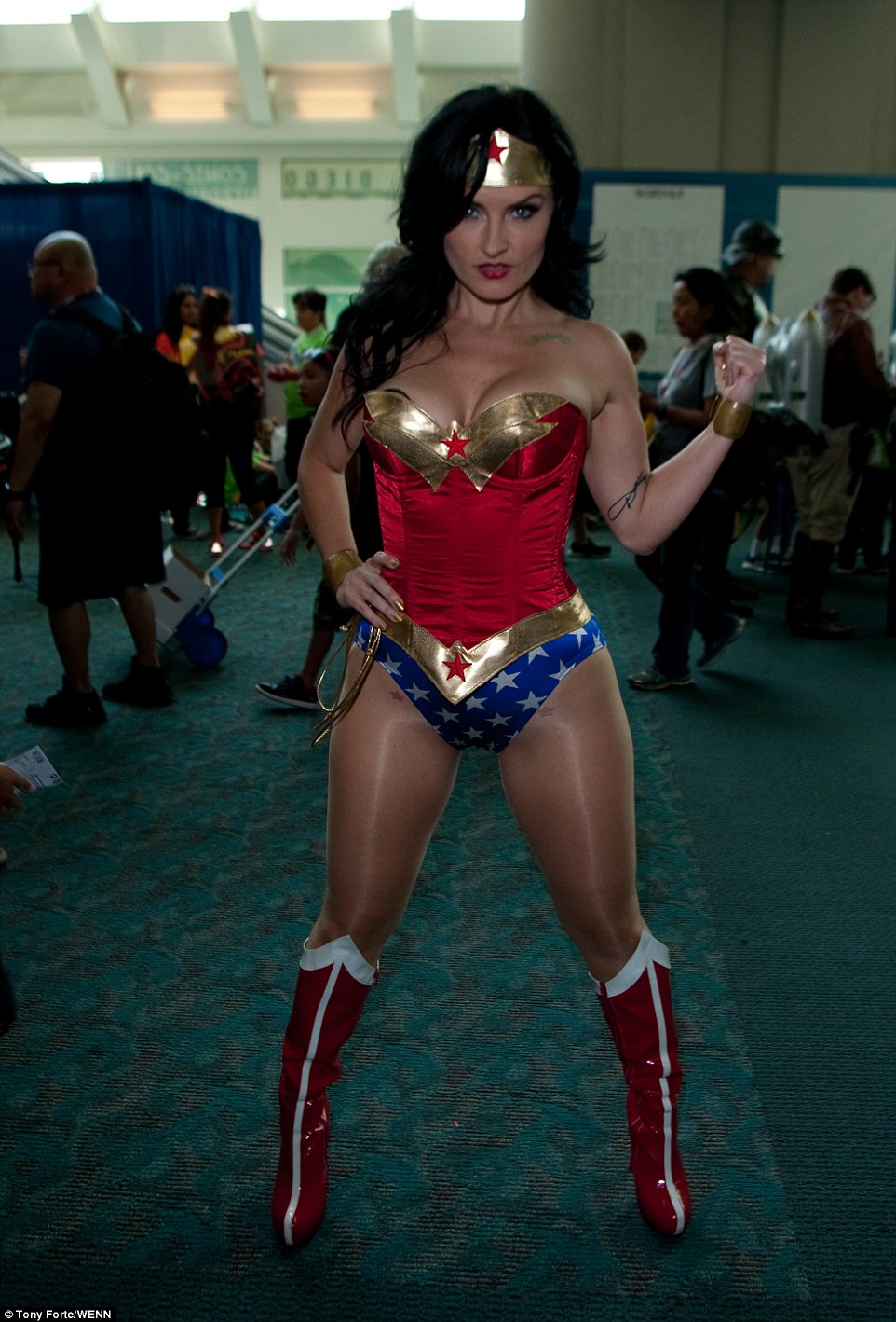 2A64E71200000578-3157610-Dressed_up_One_of_the_Wonder_Woman_who_attended_the_opening_day_-a-70_1436643026441