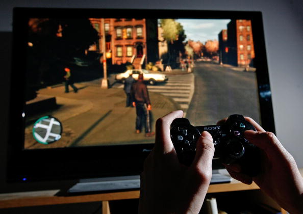 LONDON - APRIL 29:  A young man plays Grand Theft Auto IV on the game's day of release on April 29, 2008 in London, England. The game designed for the Playstation 3 was in high demand and sold out in stores across London during its first day of sale.  (Photo by Cate Gillon/Getty Images)