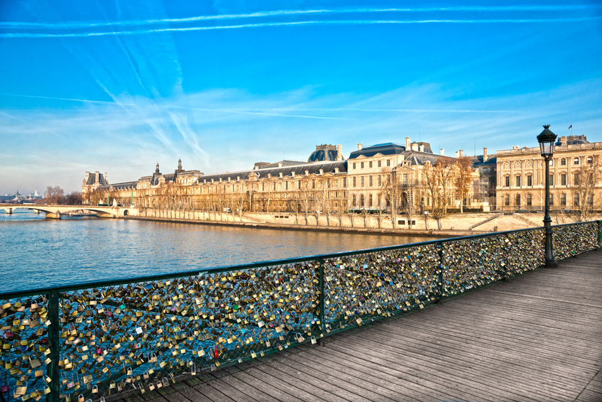 View of the Louvre Museum and Pont ses arts, Paris - France