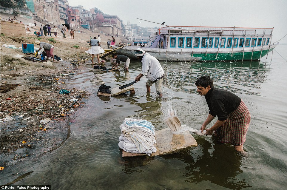 2D04C2CB00000578-3257757-Men_in_Varanasi_India_wash_laundry_on_the_shores_of_the_Ganges_r-a-92_1443800100497