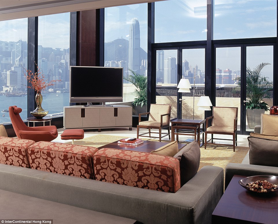 2D3CC44800000578-3265077-A_duplex_living_room_with_two_storey_windows_and_a_2_500_square_-a-3_1444722189394
