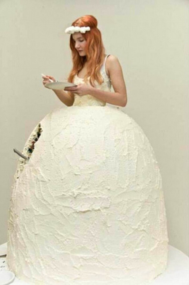 2DE1C8D800000578-3288431-One_flame_haired_bride_shows_off_an_outfit_made_out_of_a_giant_c-m-24_1446215839692