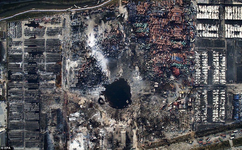3157151300000578-3452659-The_picture_shows_an_aerial_view_of_the_destruction_after_the_ex-a-2_1455813038305