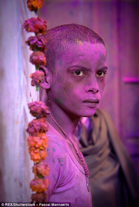 317127B400000578-3458257-A_portrait_of_Meera_Sahbaghini_covered_in_pink_powder_as_part_of-a-93_1456147898344